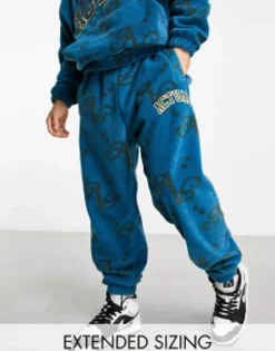 Actual Co-Ord Relaxed Polar Fleece Joggers With All Over Print And Applique Logo In