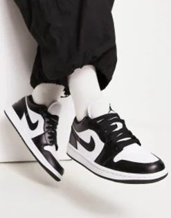 Jordan Aj1 Low Trainers In And Black